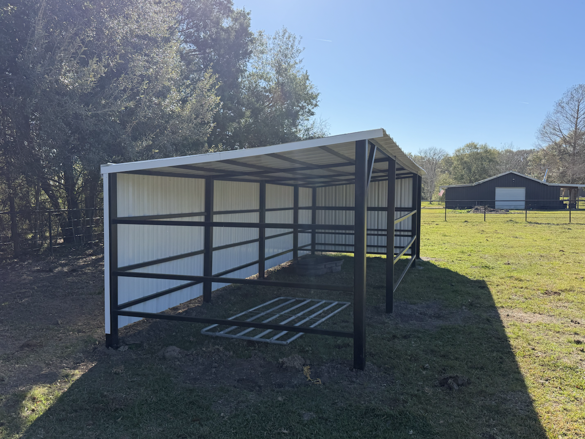 Custom livestock shelter open side view