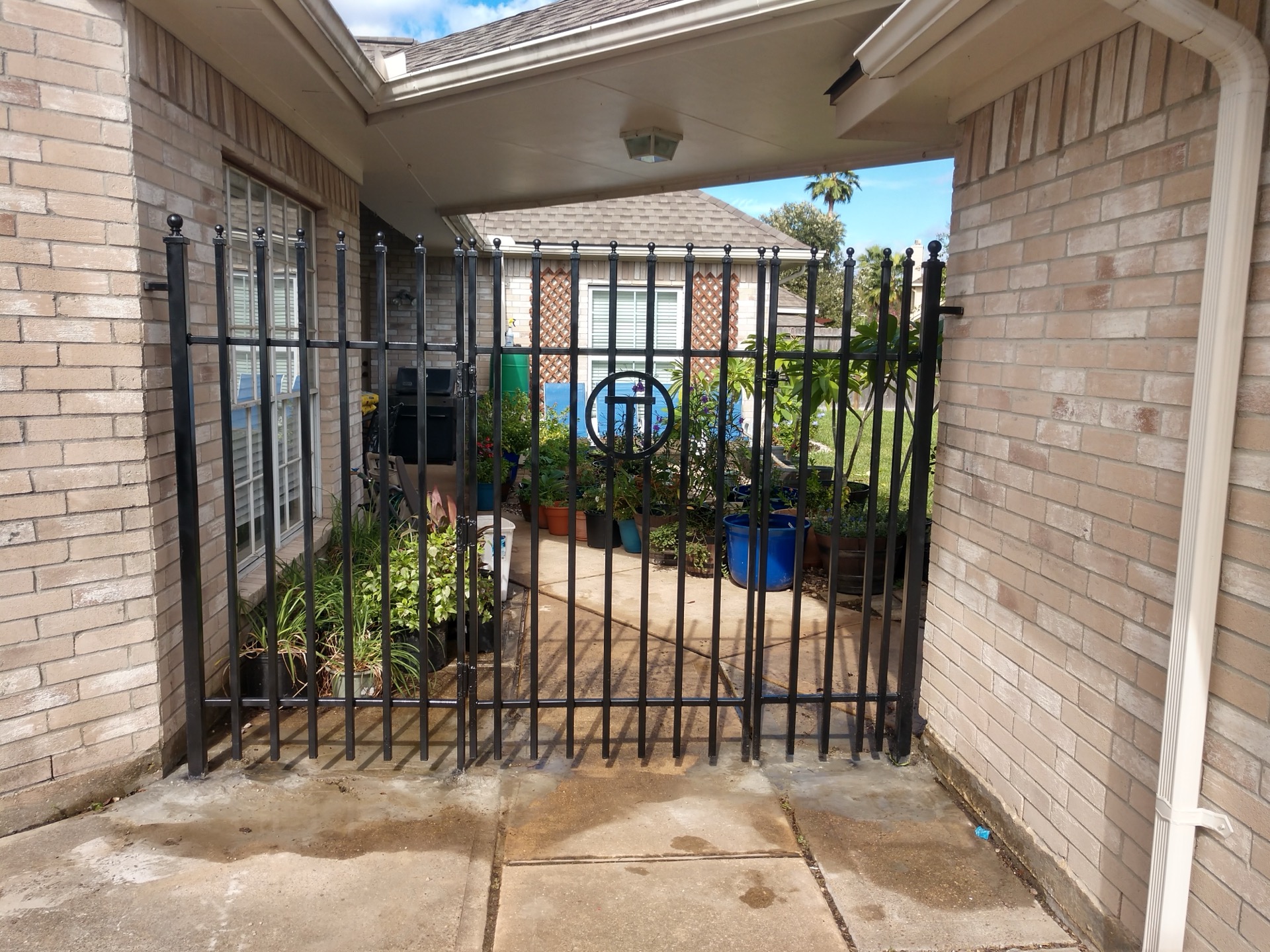 Black courtyard security gate