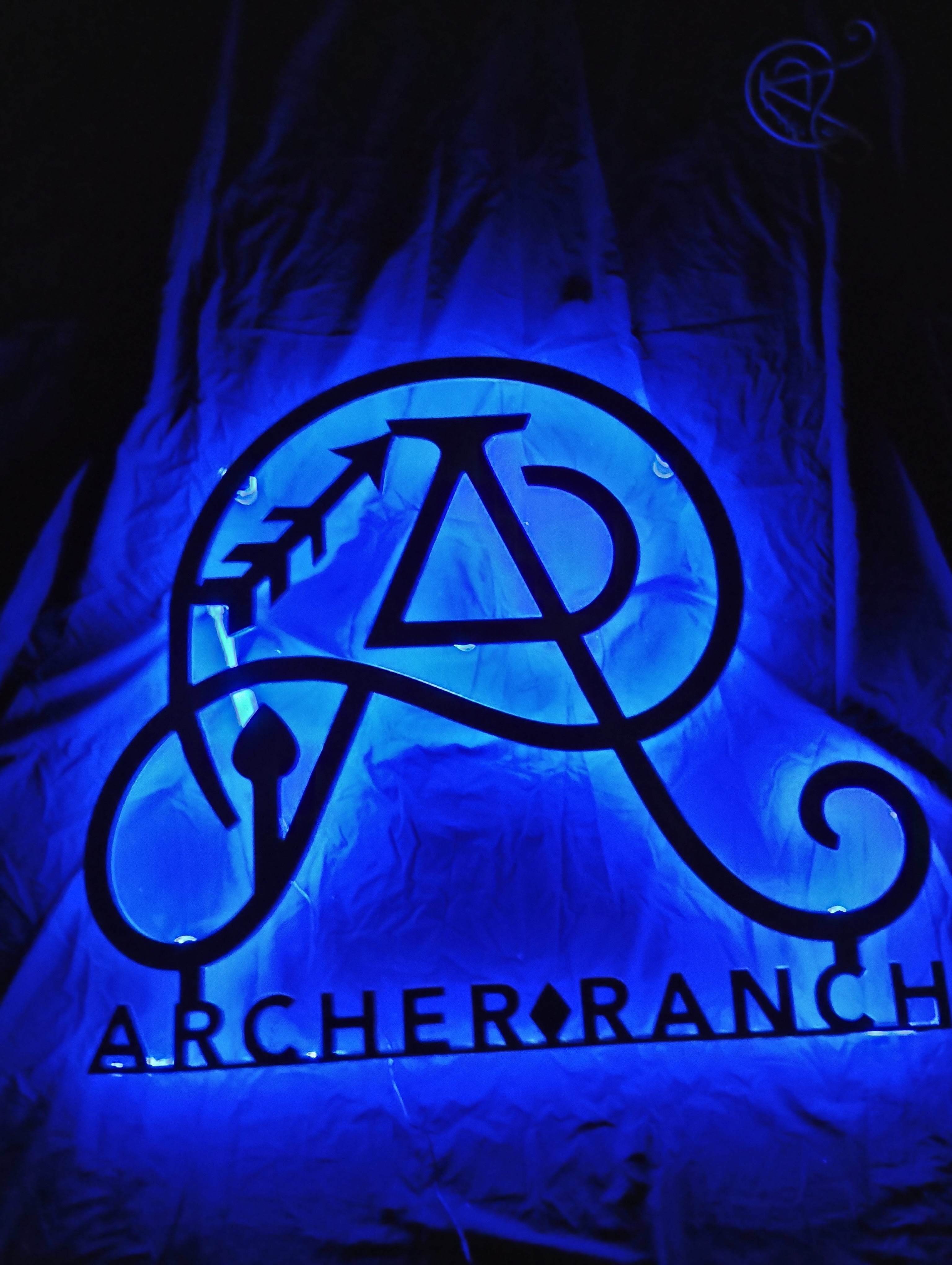 Archer Ranch sign with blue LED backlight