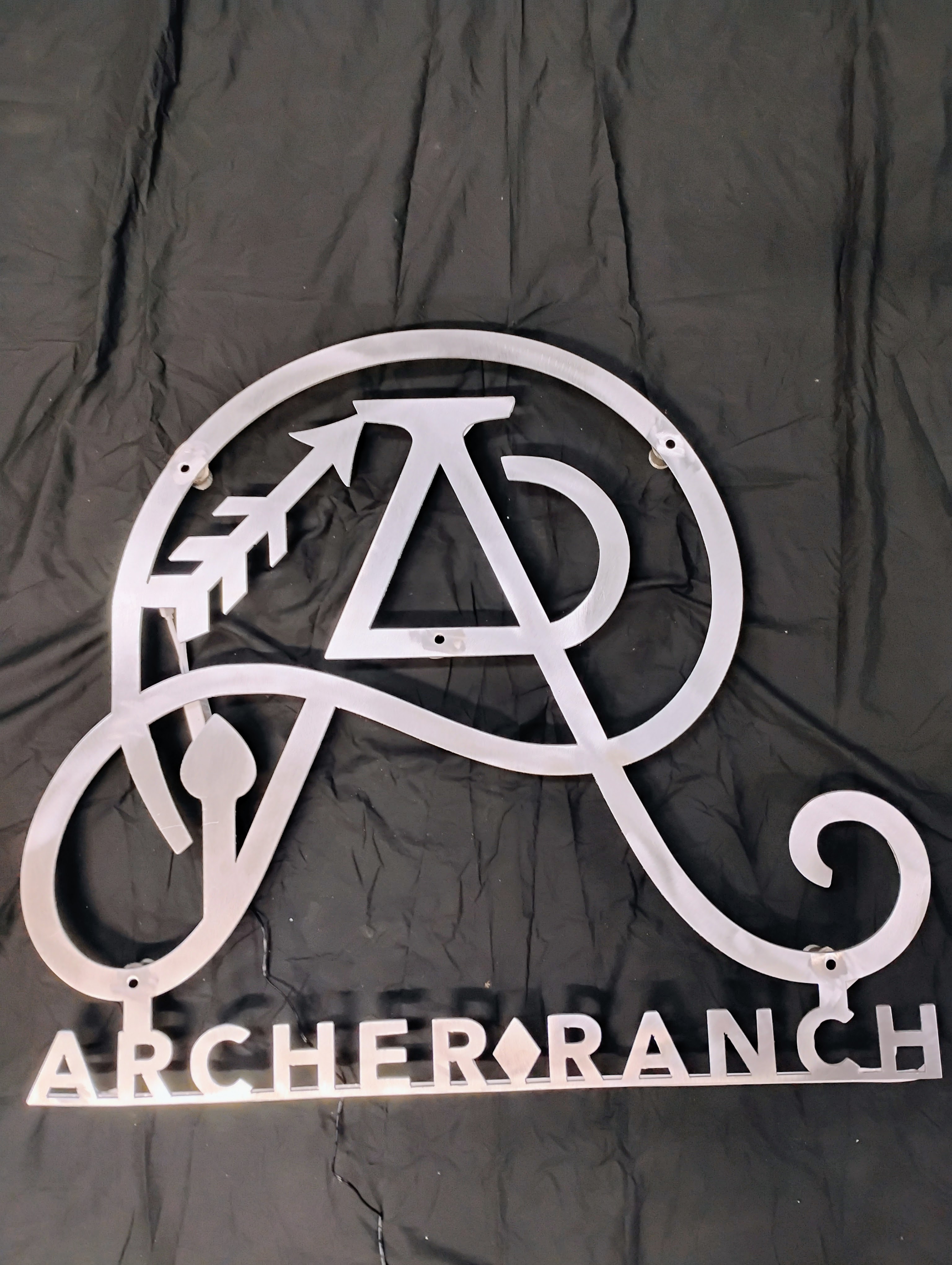 Raw steel Archer Ranch custom sign